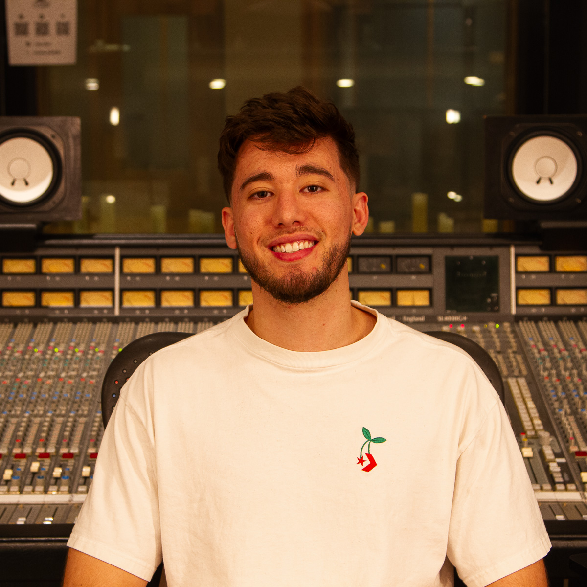 Erik Pedersen seated in front of a recording console